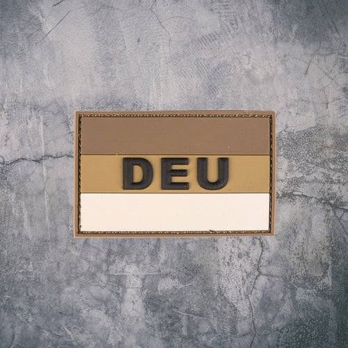 `Tactical DEU Patch in Beige und Braun vor grauem Hintergrund`
